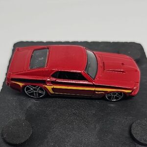 Red Toy Car with Yellow Stripe